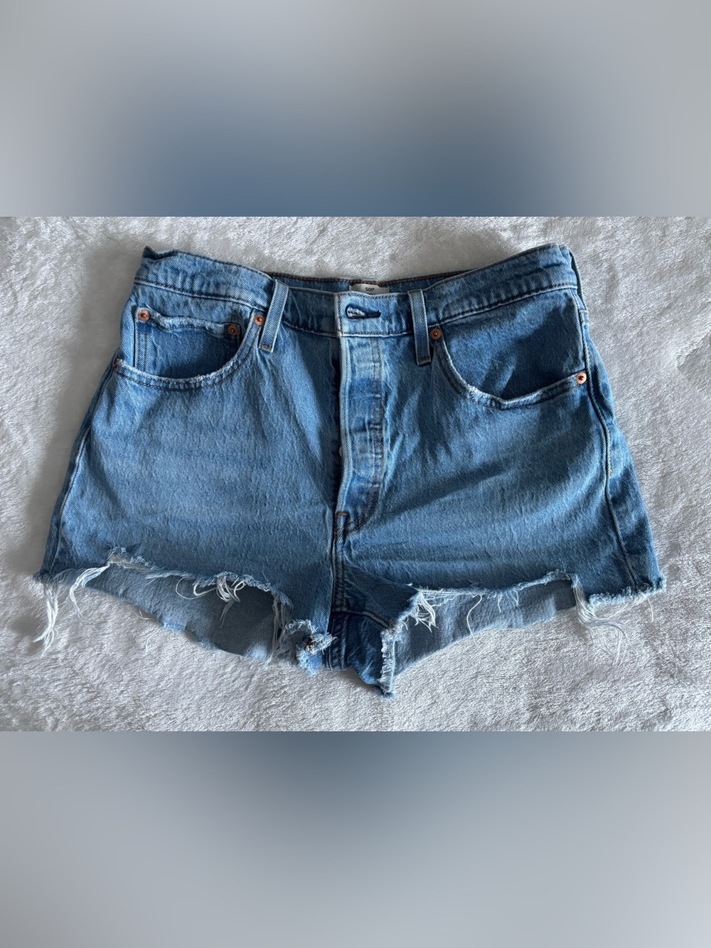 Levi's Distressed Medium Blue Denim Cutoff Shorts